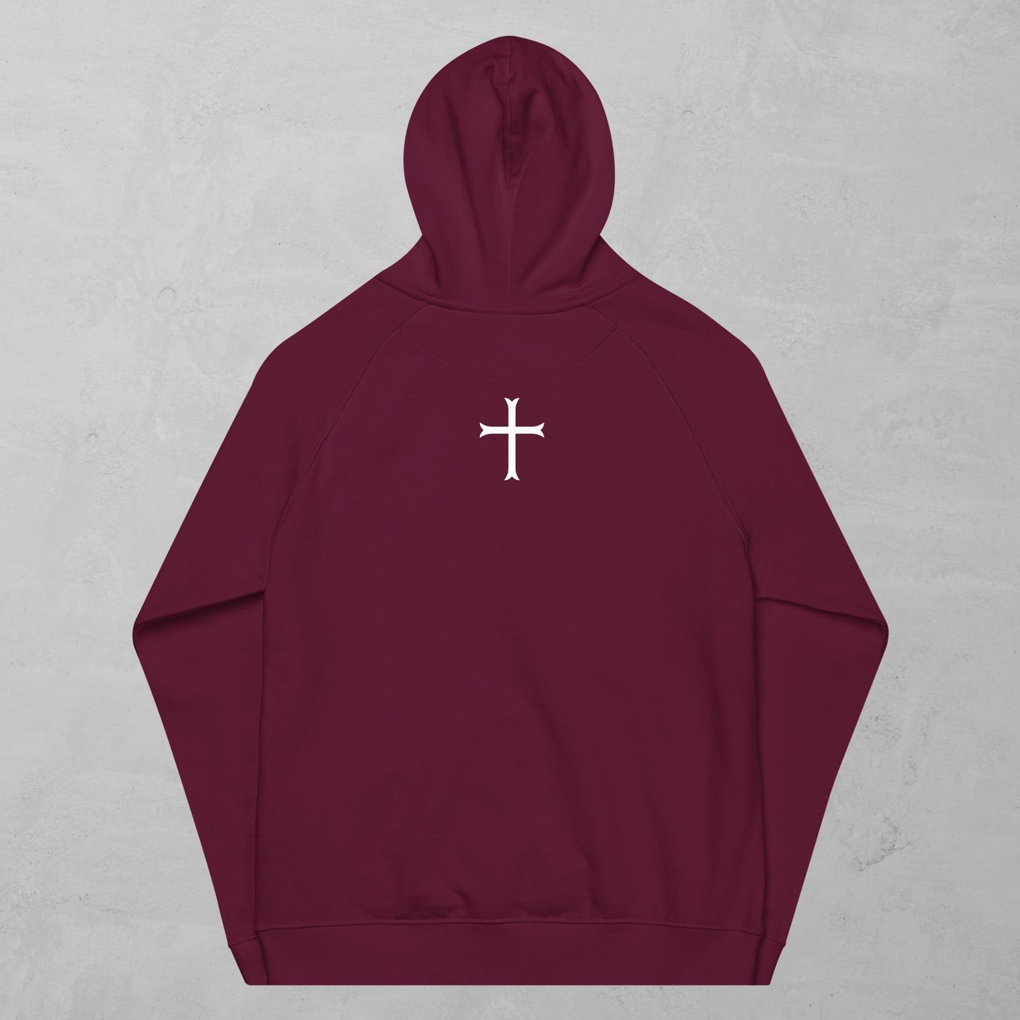 Cross in white hoodie