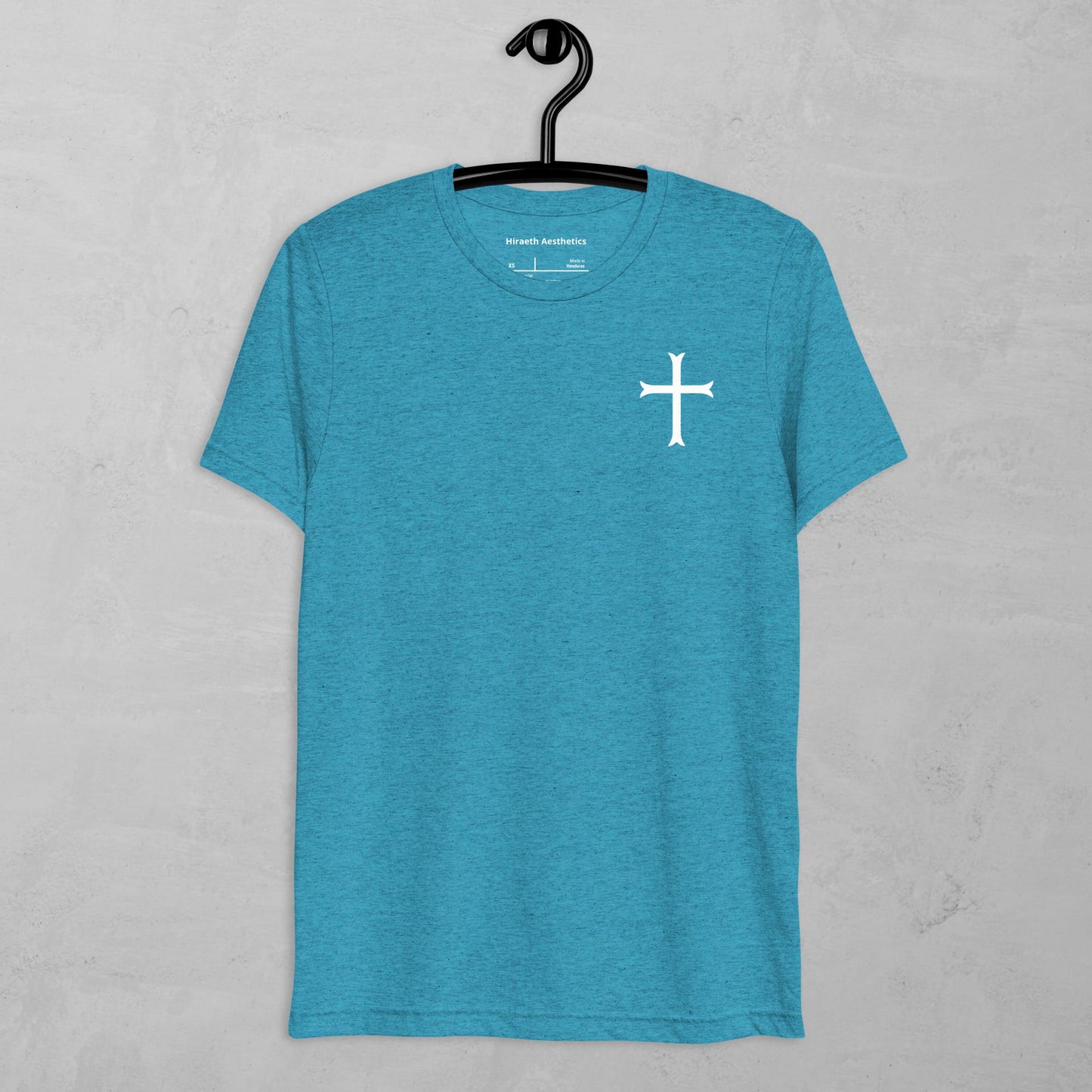 Cross in white t-shirt