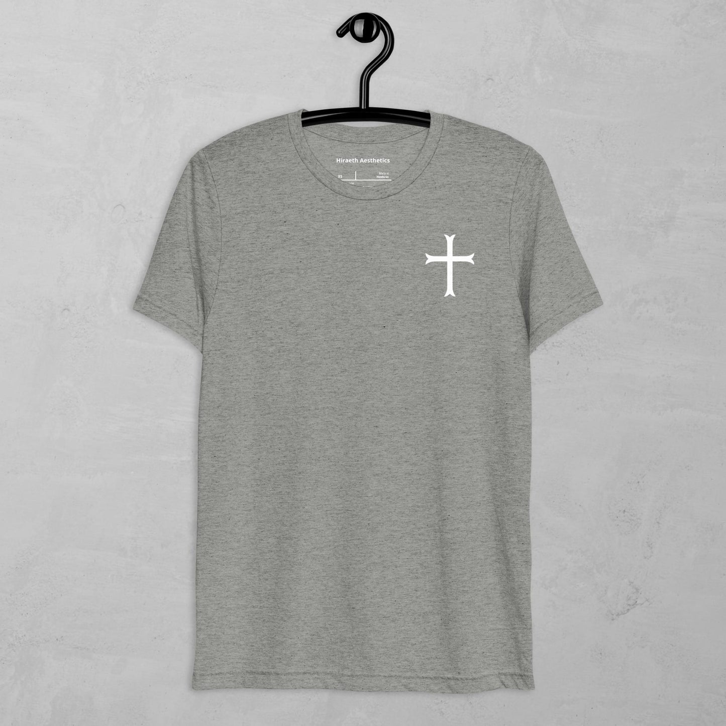 Cross in white t-shirt