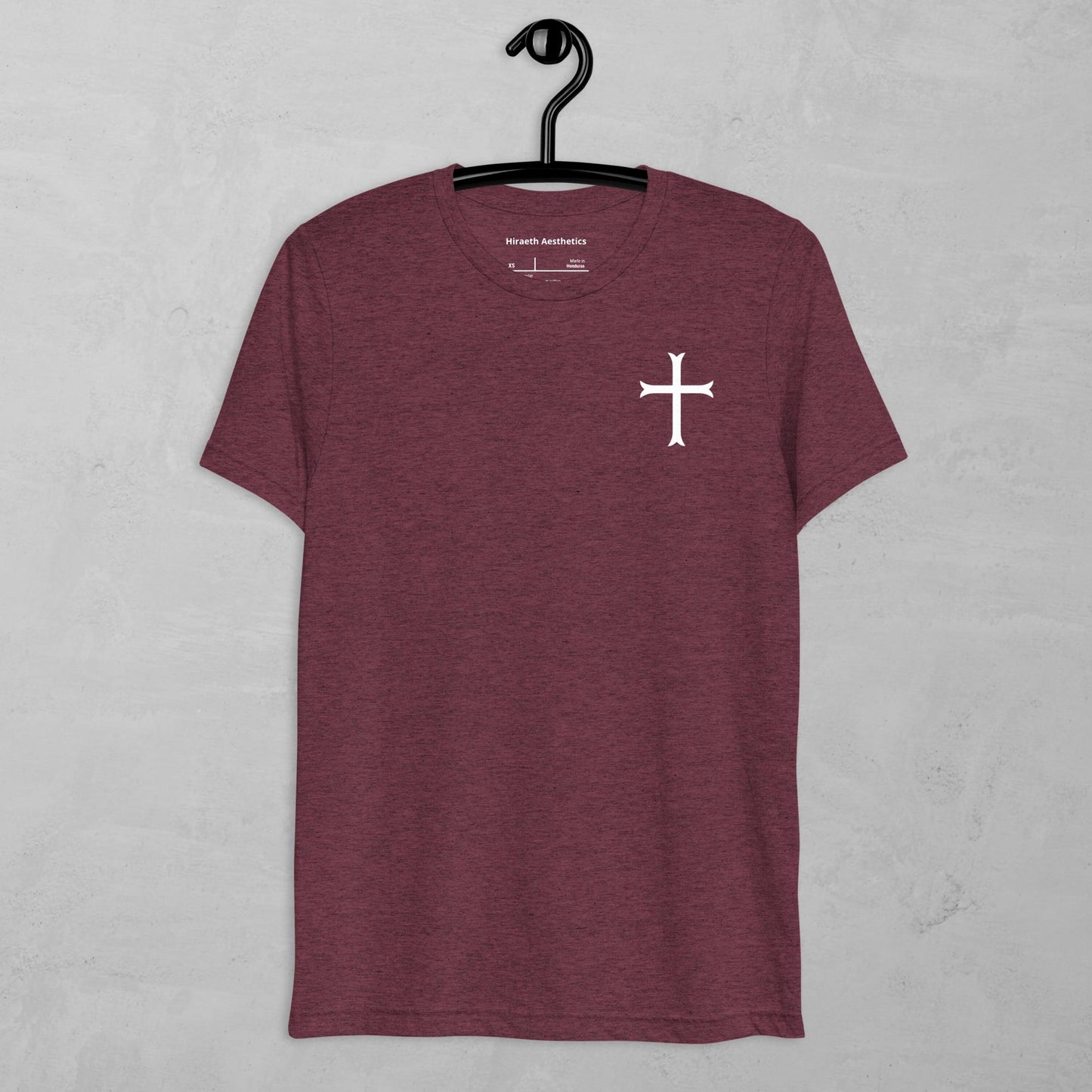 Cross in white t-shirt